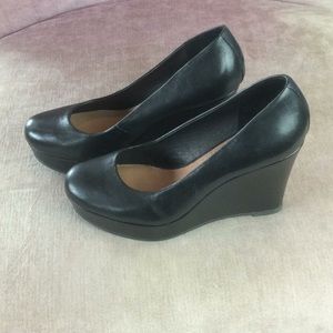 Black leather Aldo platform wedges, size 7.5